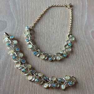 Lalitha Jewellery Elegant Gold Floral Jewelry Set with Blue Accents